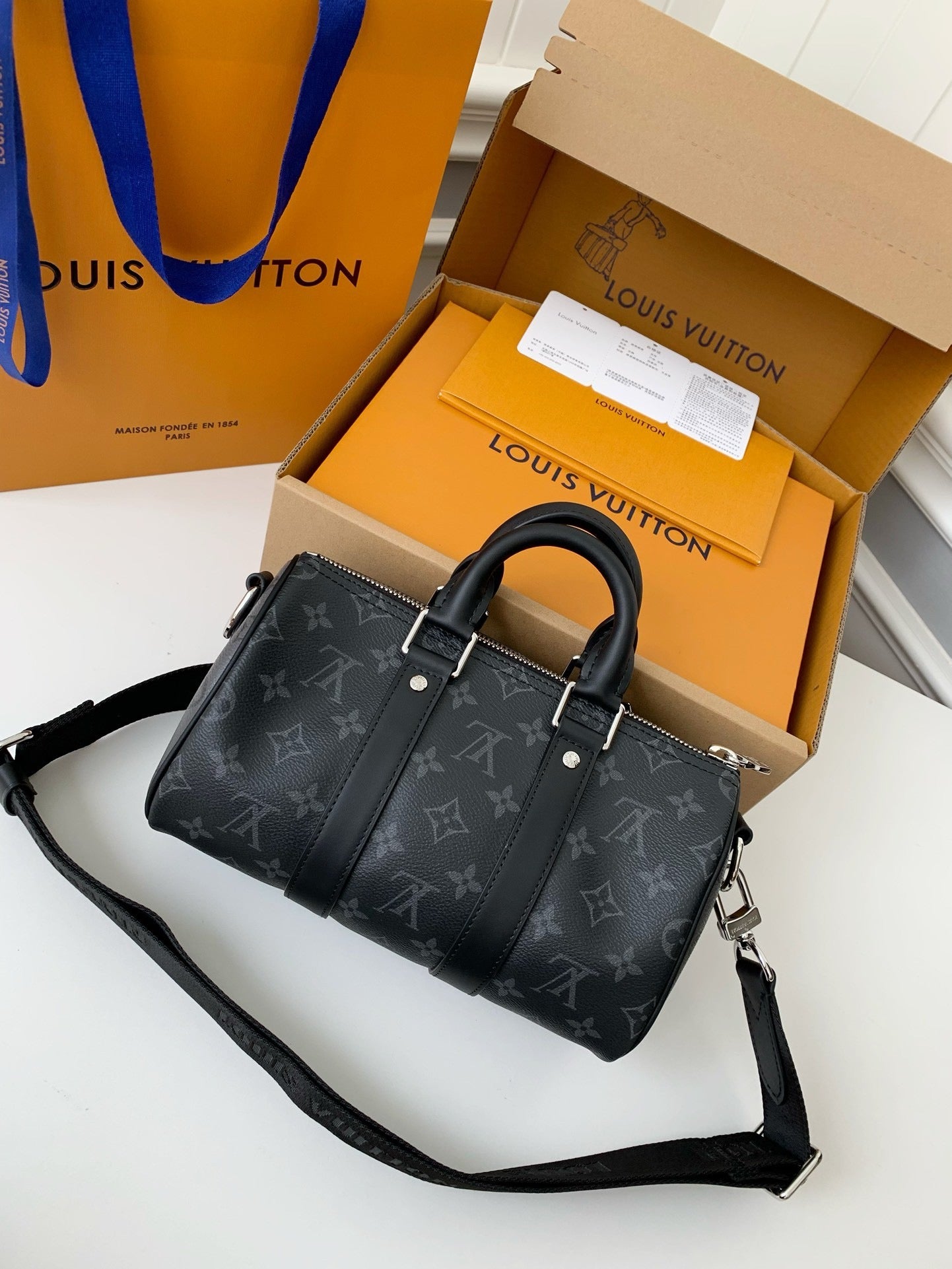LV Keepall Bandoulière 25 Bag
