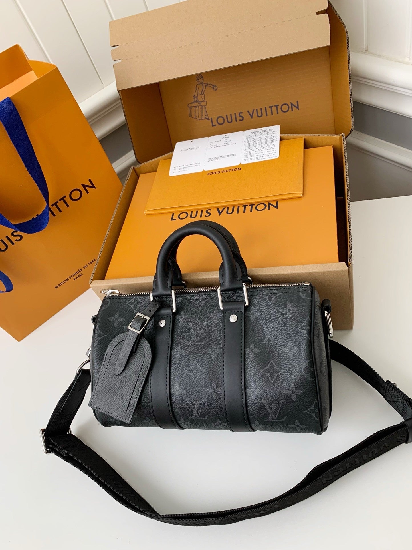 LV Keepall Bandoulière 25 Bag